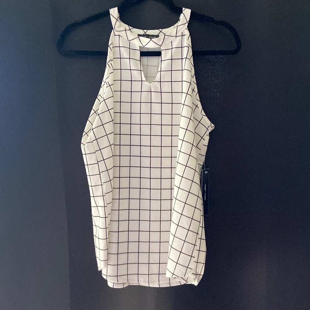 Brand new summer blouse with tag. Size Large